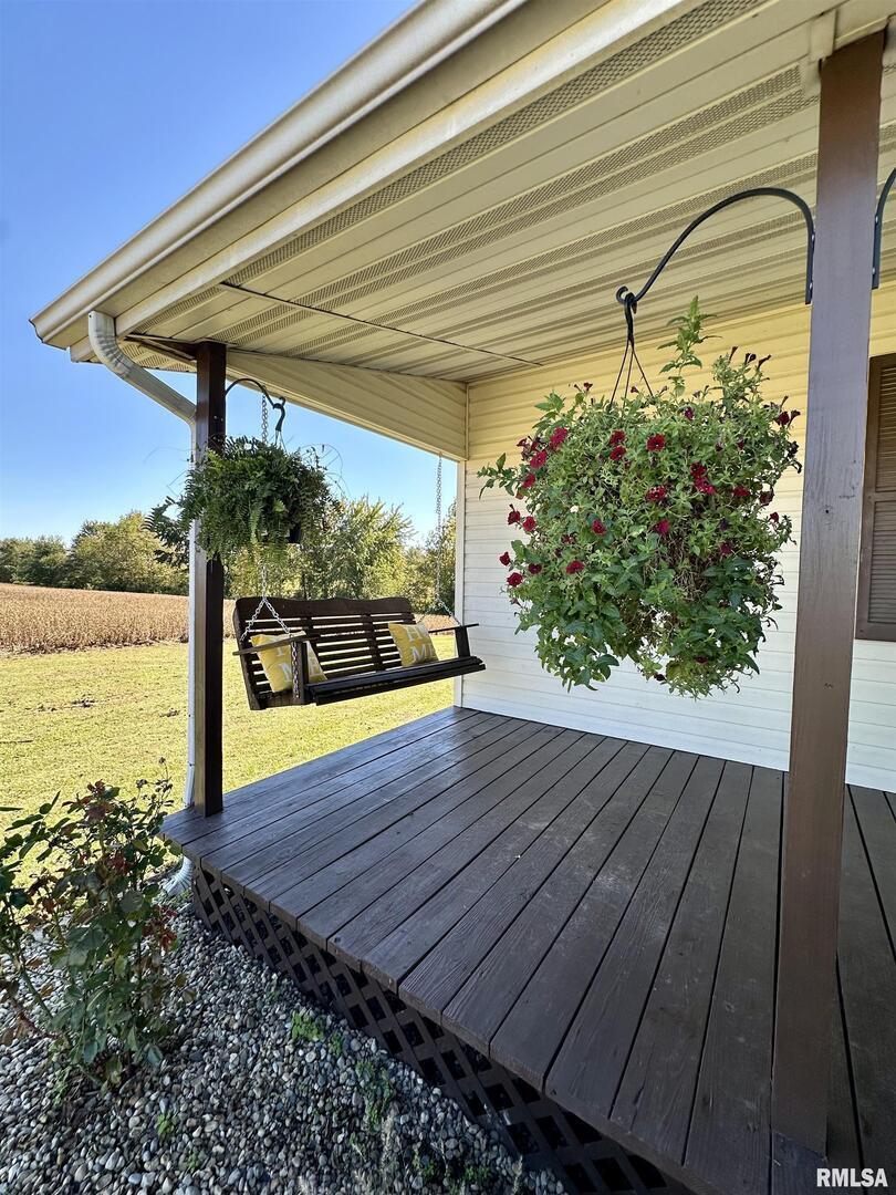 878 County Road 600N Sims, IL 62886 - Photo 14 of 82 a view of a room with wooden floor and floor to ceiling window
