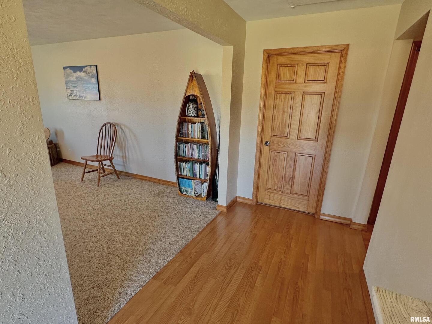 878 County Road 600N Sims, IL 62886 - Photo 21 of 82 a view of a bedroom with a furniture and wooden floor