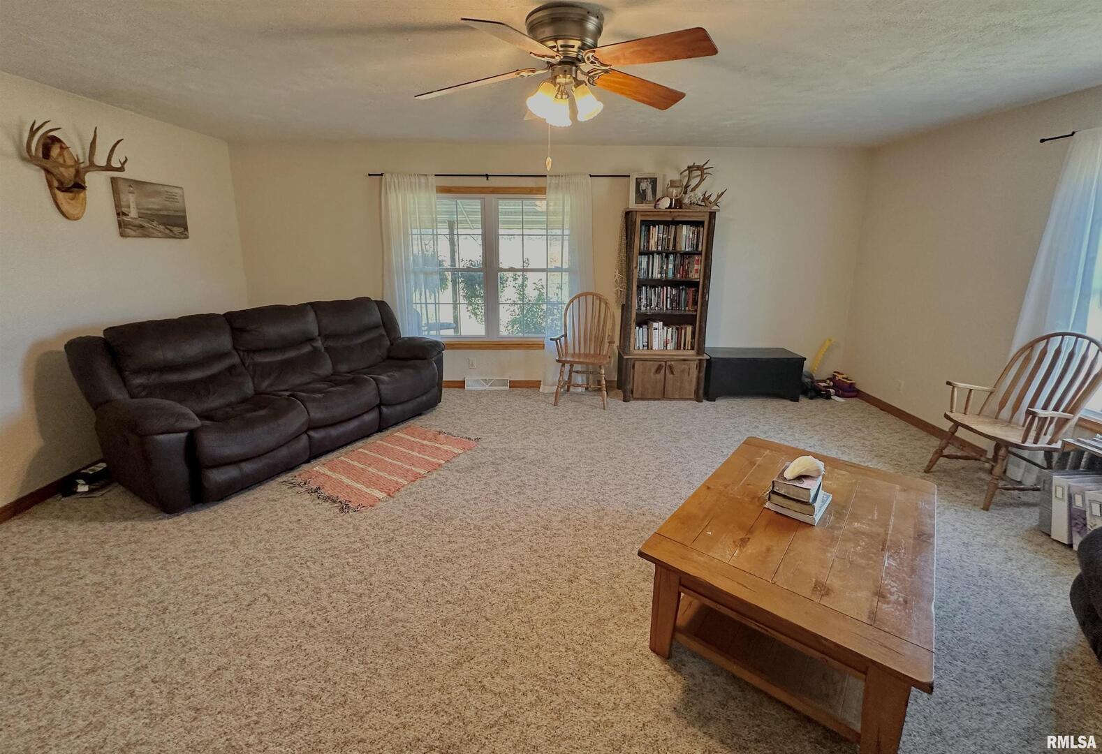 878 County Road 600N Sims, IL 62886 - Photo 24 of 82 a living room with furniture and a window