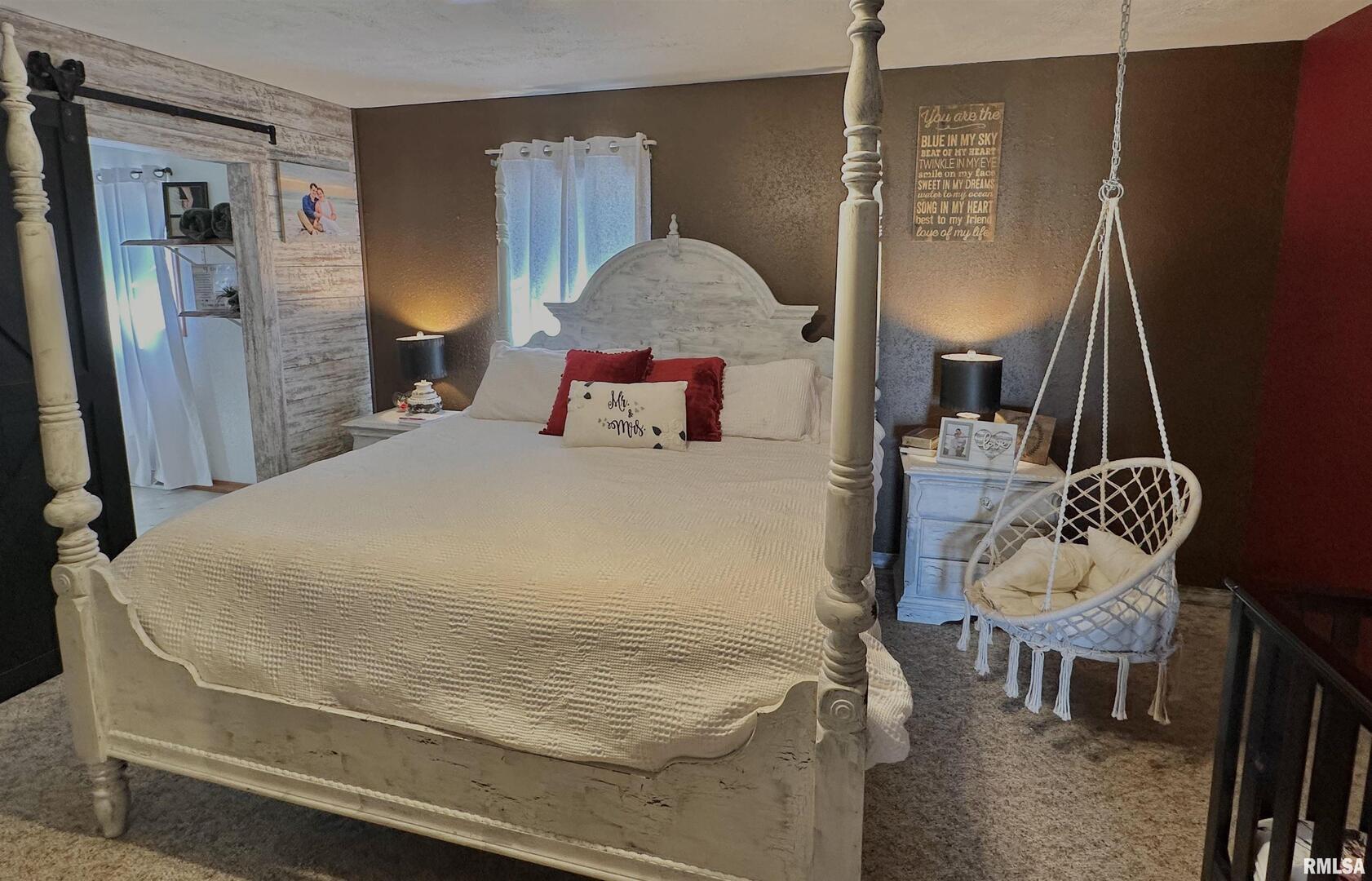 878 County Road 600N Sims, IL 62886 - Photo 27 of 82 a bedroom with a bed and dresser with wooden floor