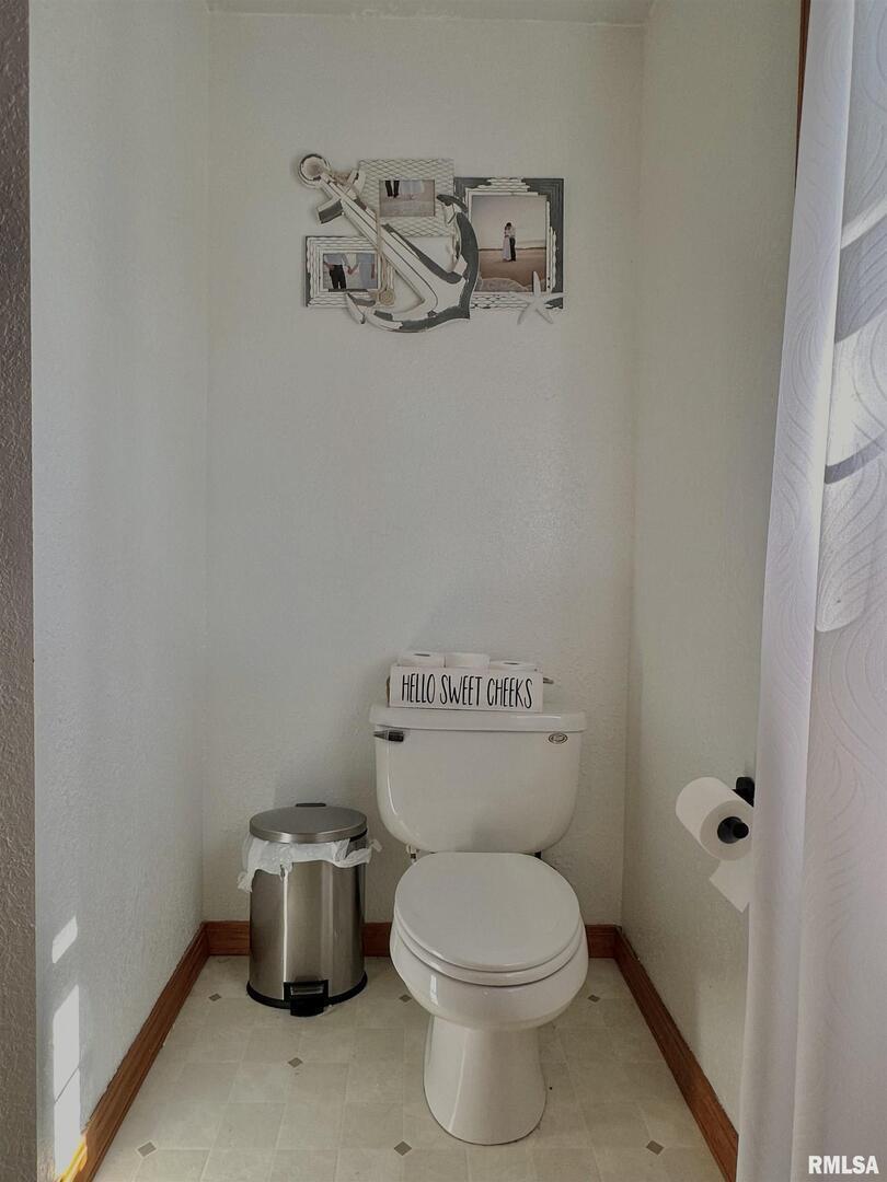 878 County Road 600N Sims, IL 62886 - Photo 33 of 82 a white toilet sitting next to a sink