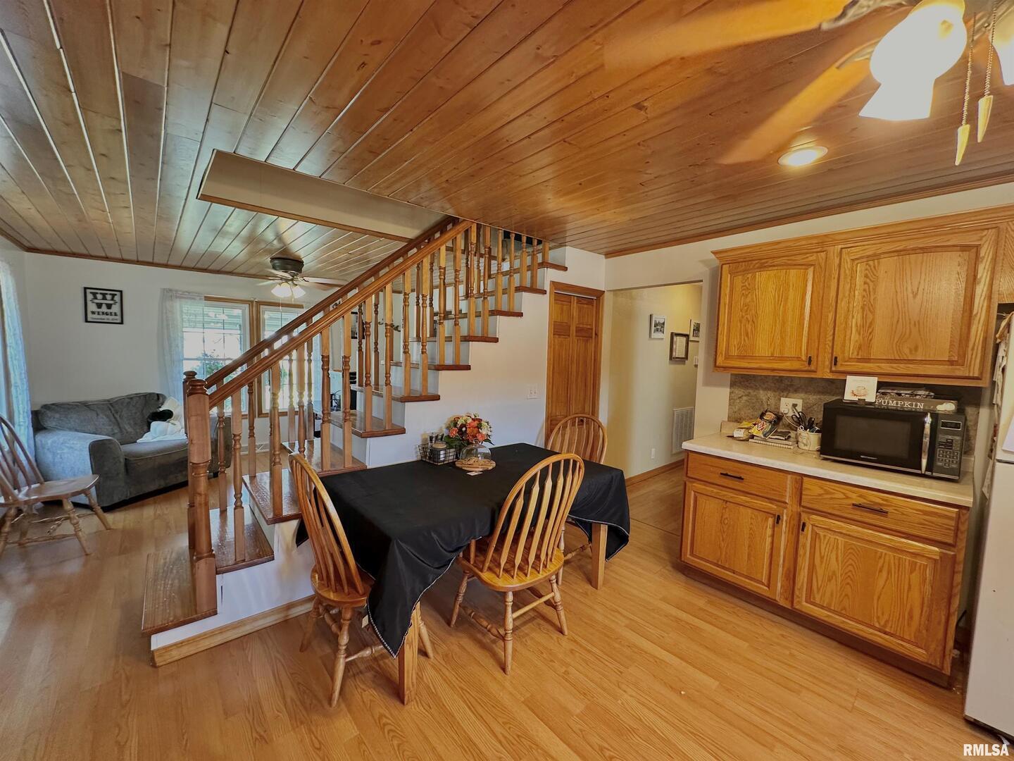 878 County Road 600N Sims, IL 62886 - Photo 42 of 82 a view of a dining room with furniture window and wooden floor
