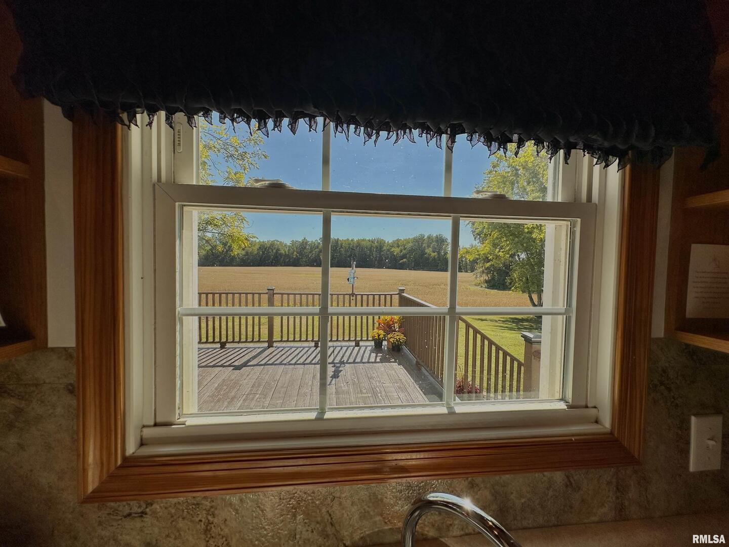 878 County Road 600N Sims, IL 62886 - Photo 45 of 82 a view of a porch and a floor to ceiling window
