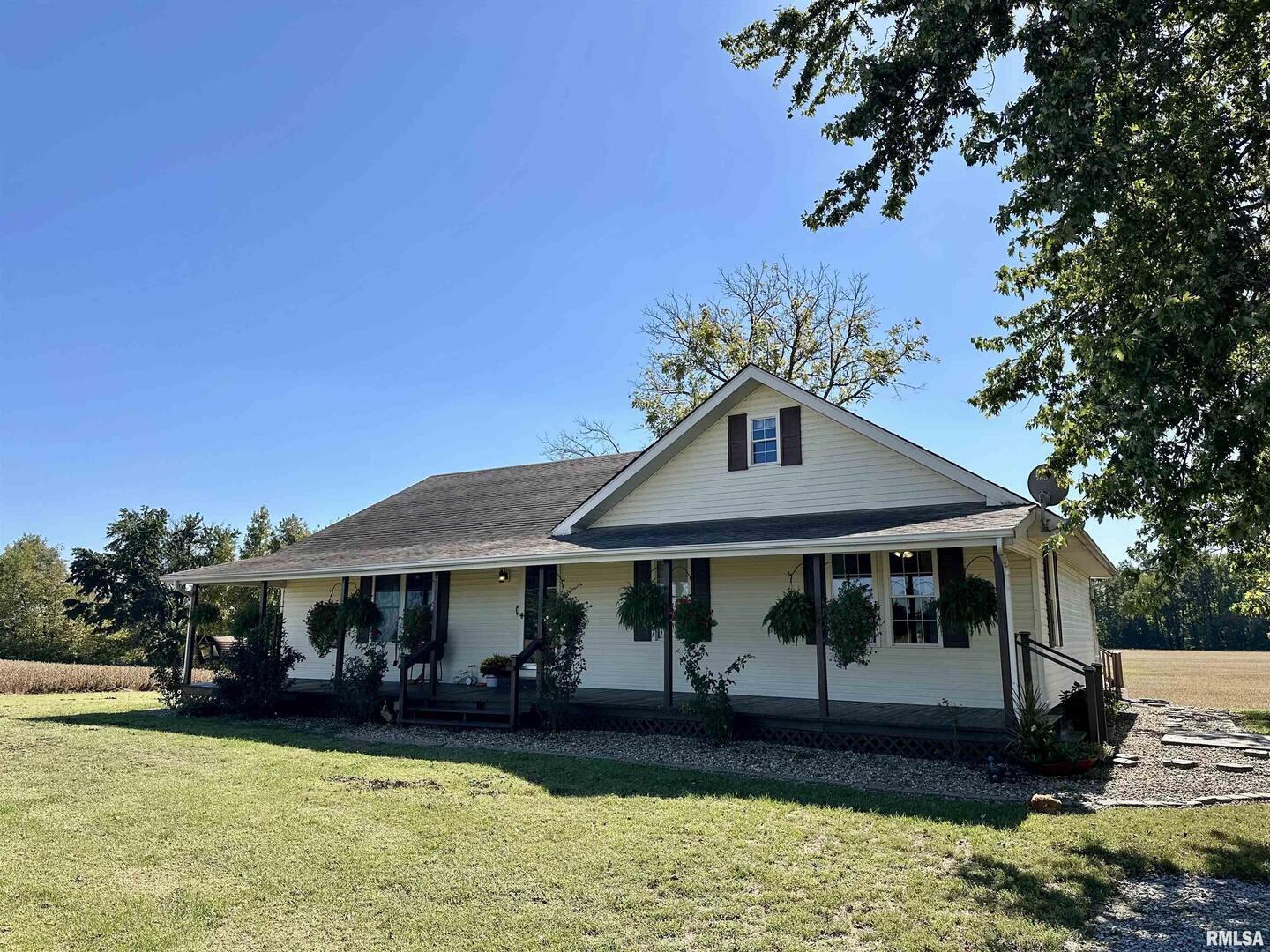 878 County Road 600N Sims, IL 62886 - Photo 9 of 82 a front view of a house with garden