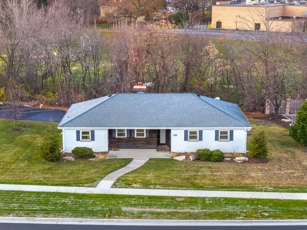 front view of house with a yard
