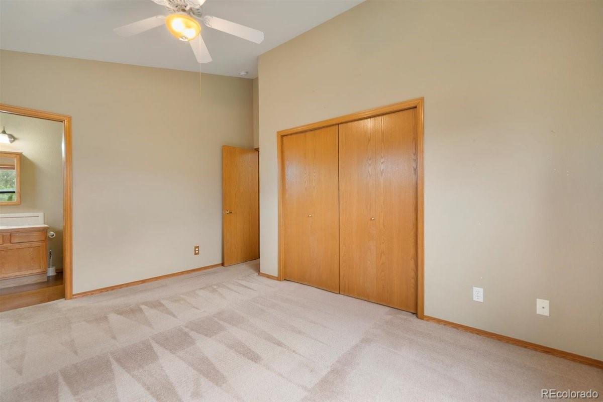 833 Wade Road Longmont, CO 80503 - Photo 24 of 40 an empty room with a window