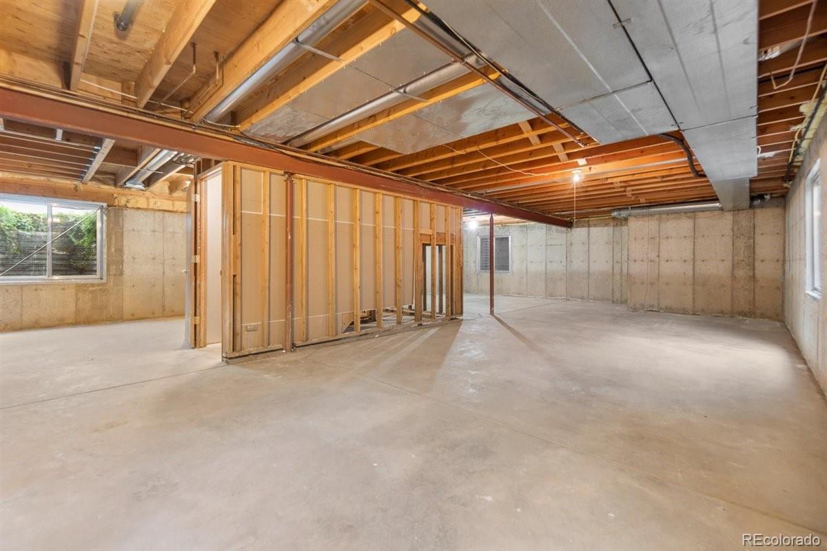 833 Wade Road Longmont, CO 80503 - Photo 28 of 40 a view of a room with wooden walls