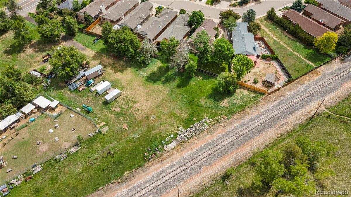 833 Wade Road Longmont, CO 80503 - Photo 37 of 40 a view of a garden with a pathway
