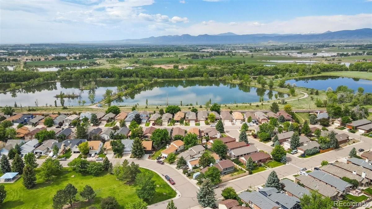 833 Wade Road Longmont, CO 80503 - Photo 39 of 40 a view of lake and mountain