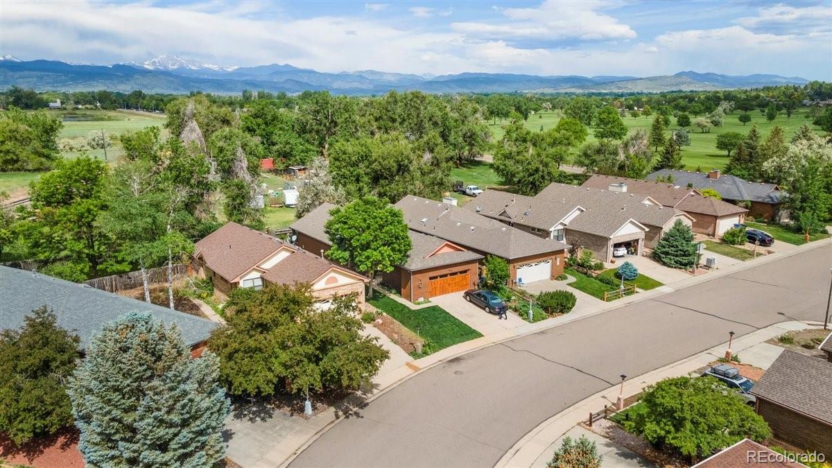 833 Wade Road Longmont, CO 80503 - Photo 40 of 40 an aerial view of a house with a garden