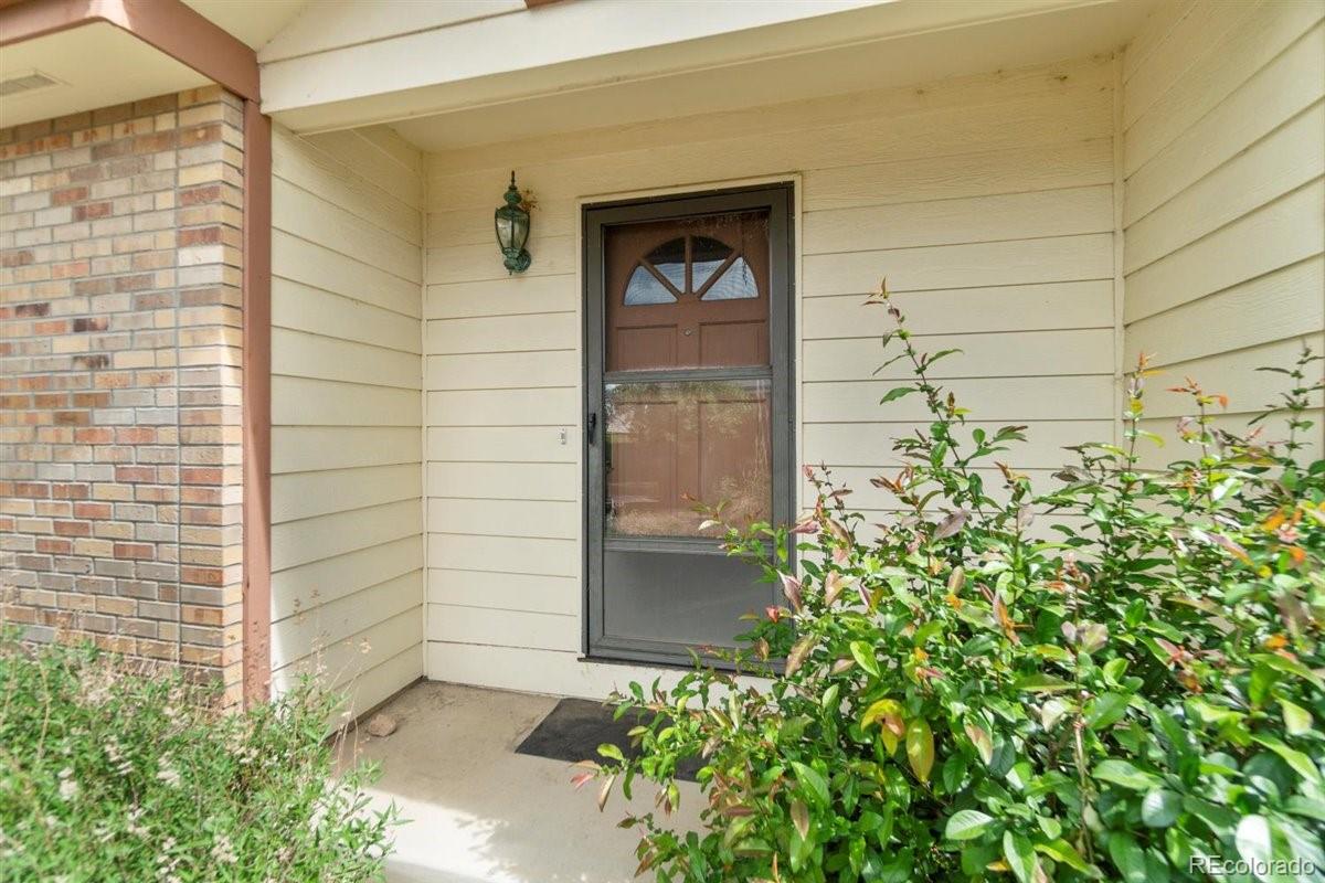 833 Wade Road Longmont, CO 80503 - Photo 5 of 40 a view of a door of the house