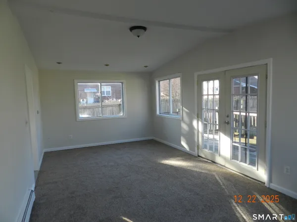 an empty room with windows