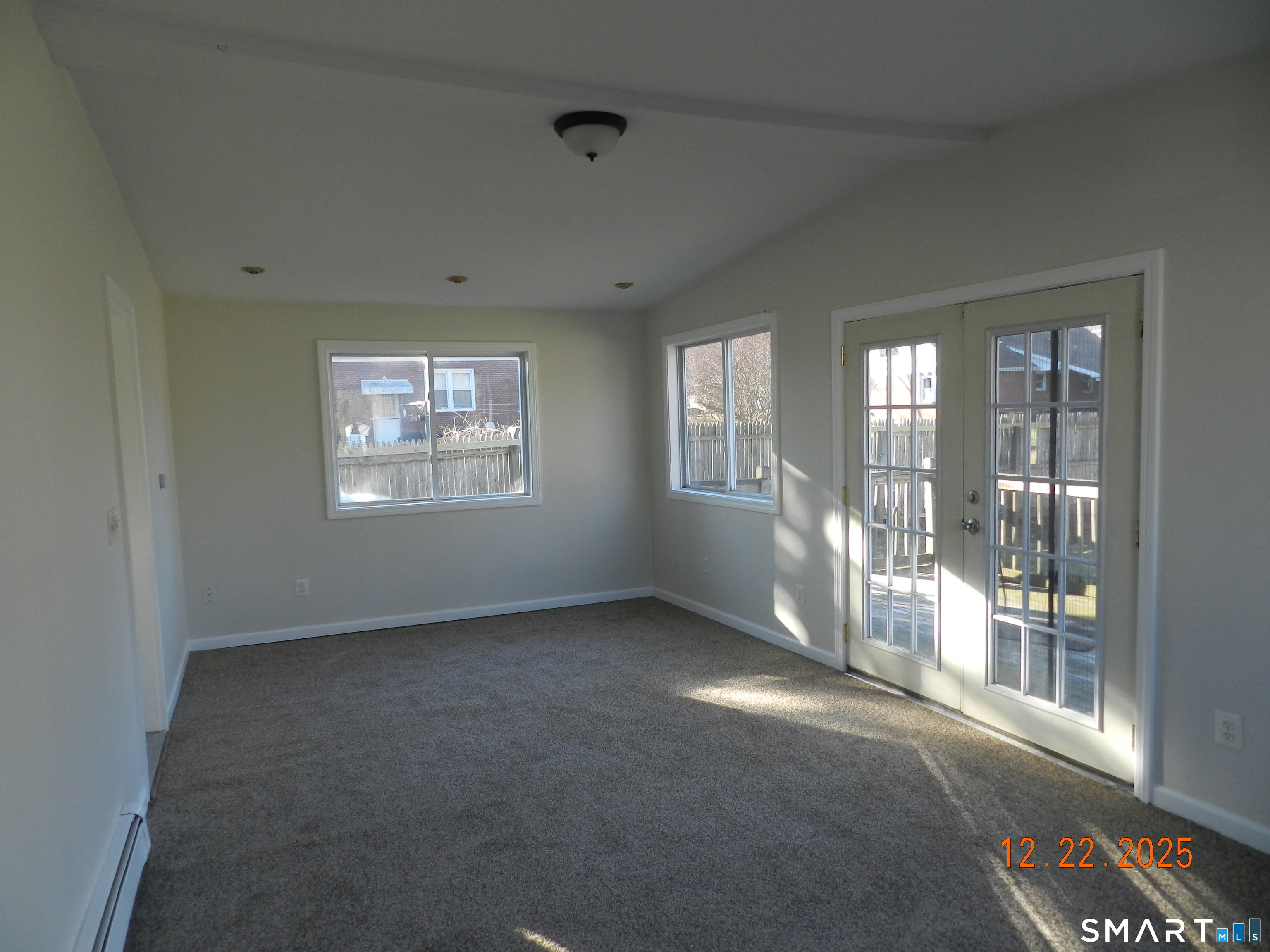 10 Poplar Street Windsor Locks, CT 06096 - Photo 8 of 9 an empty room with windows