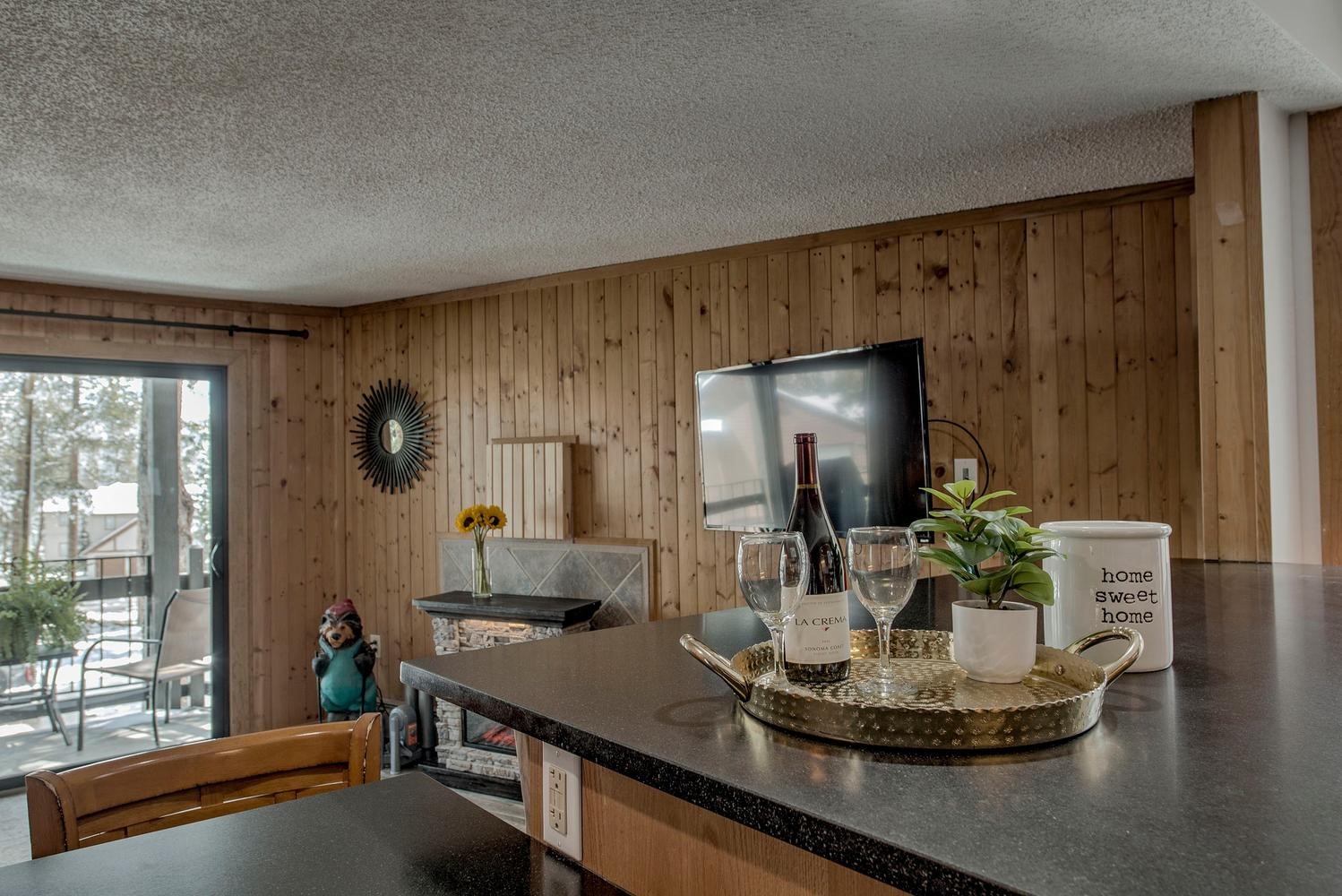 1075 Ski Hill Road, Unit 46 Breckenridge, CO 80424 - Photo 14 of 41 a room with a large window and furniture