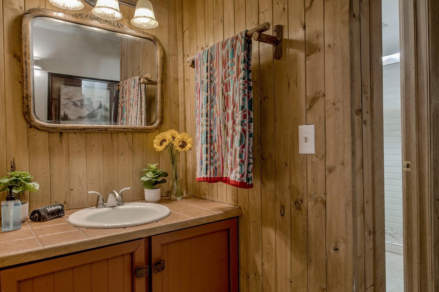 1075 Ski Hill Road, Unit 46 Breckenridge, CO 80424 - Photo 20 of 41 a bathroom with a sink and a mirror