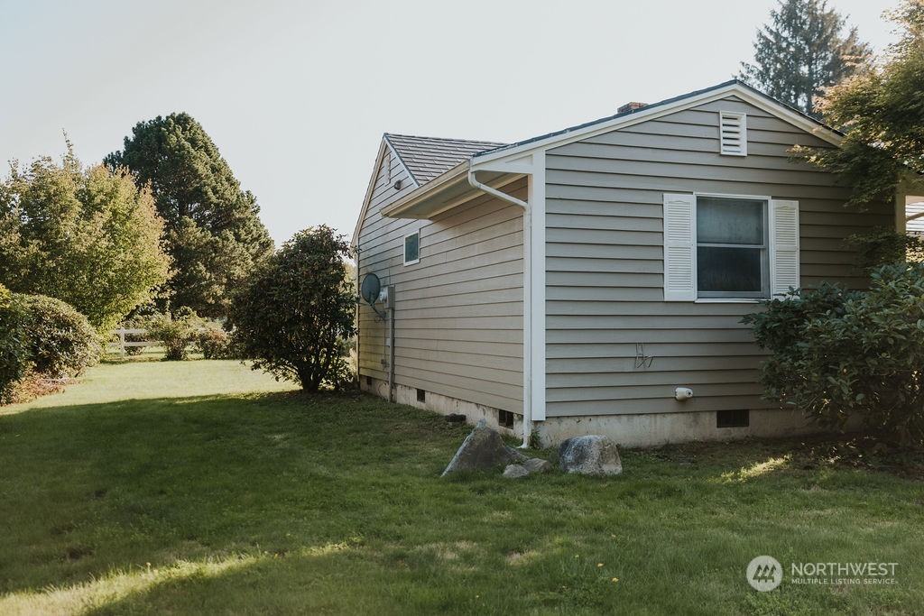 310 G Street Forks, WA 98331 - Photo 29 of 40 a front view of a house with a yard