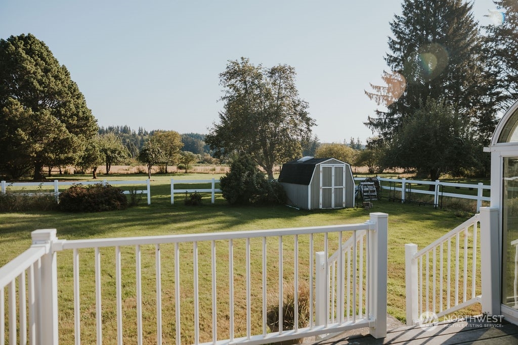 310 G Street Forks, WA 98331 - Photo 32 of 40 a front view of a house with fountain and trees