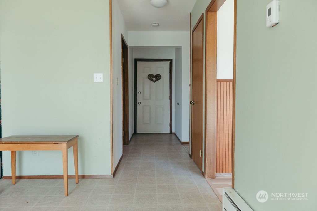 310 G Street Forks, WA 98331 - Photo 5 of 40 a view of a livingroom from a hallway