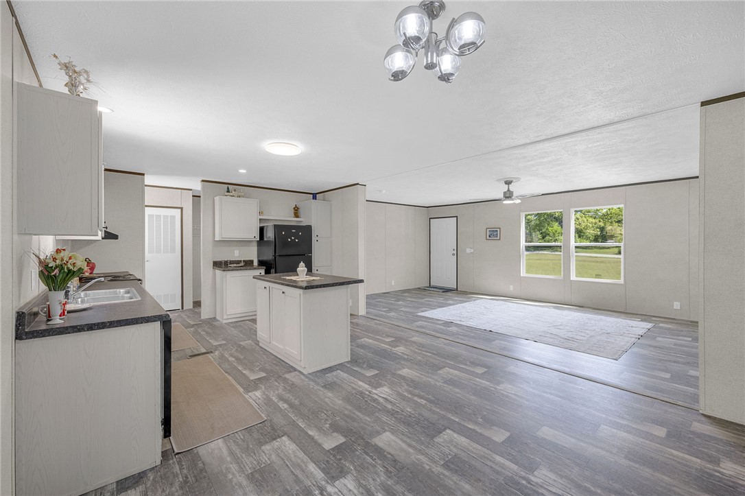 375 Griggs Road Six Mile, SC 29682 - Photo 15 of 36 This open concept living area seamlessly connects the kitchen and living room for effortless entertaining.