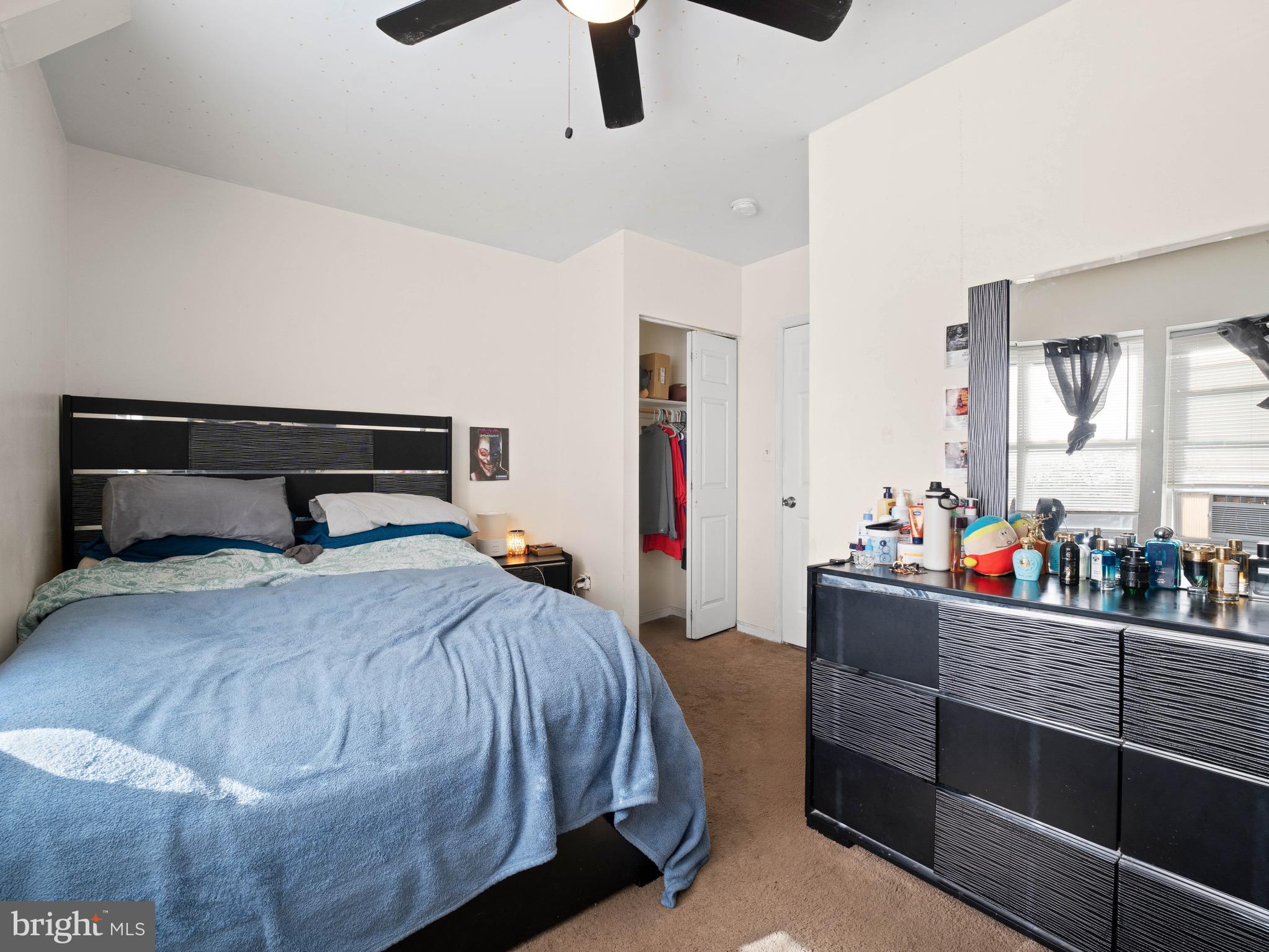 3014 Stevens Street Camden, NJ 08105 - Photo 16 of 34 a bed room with a bed and a window