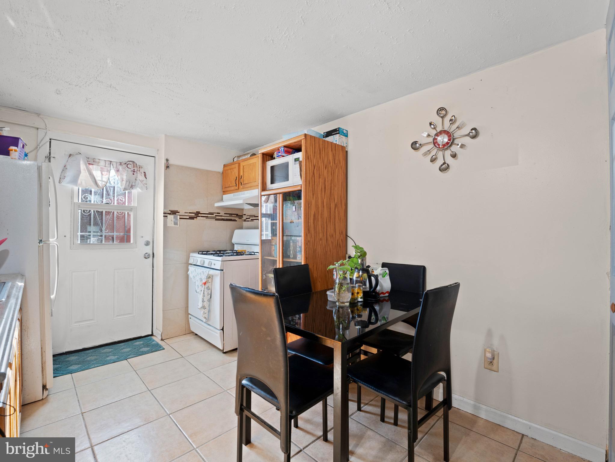 3014 Stevens Street Camden, NJ 08105 - Photo 22 of 34 a dining room with furniture and window