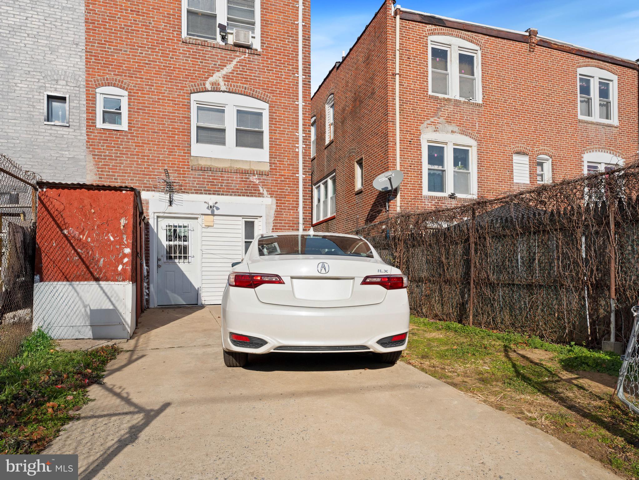 3014 Stevens Street Camden, NJ 08105 - Photo 29 of 34 a white building covered with tall trees