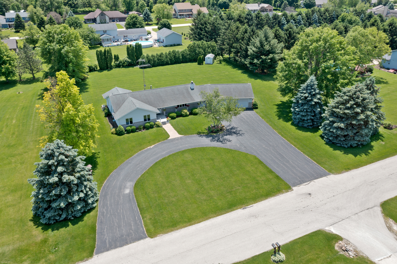 12402 Ridge Road Genoa, IL 60135 - Photo 5 of 31 an aerial view of a house