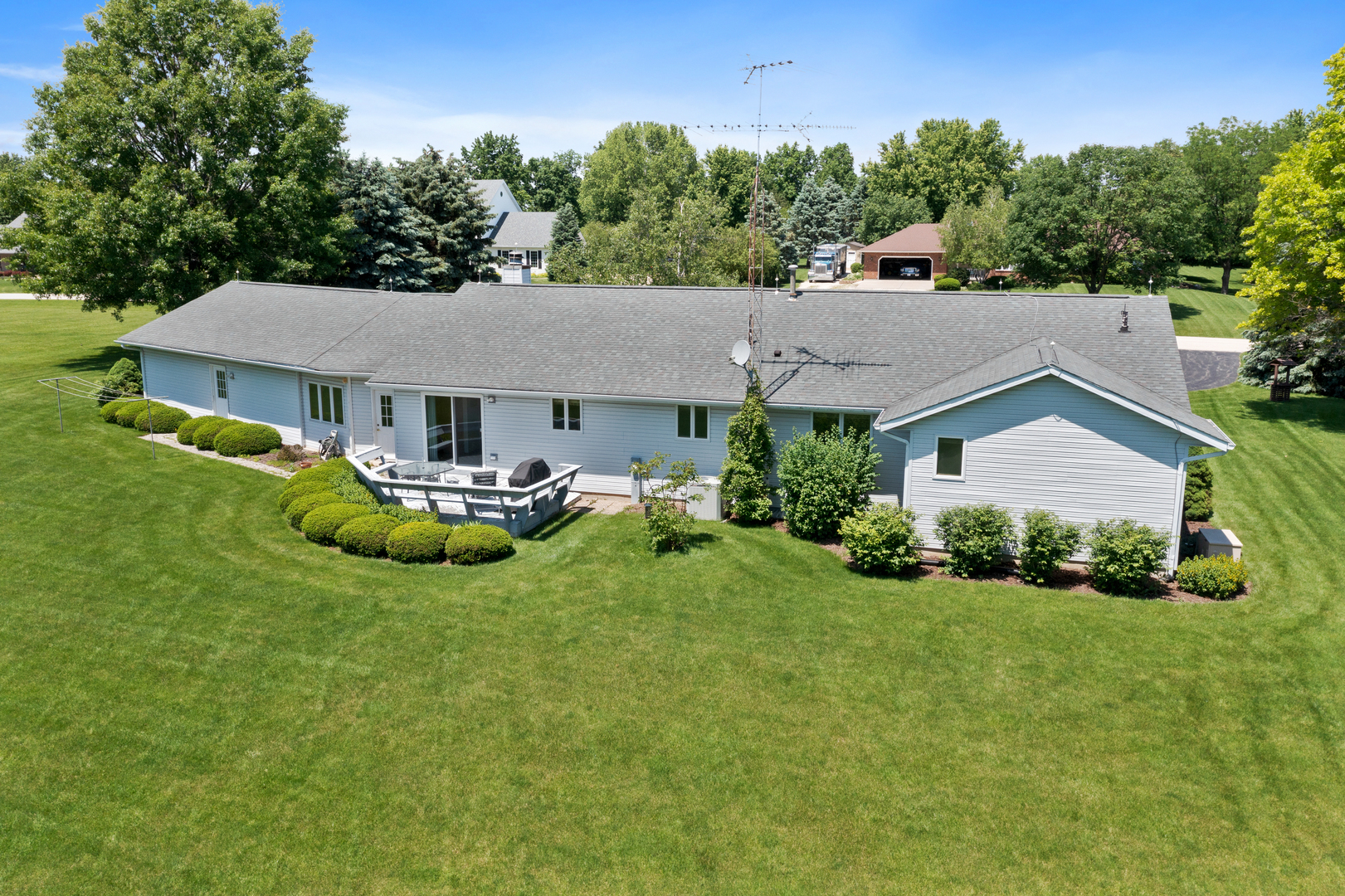 12402 Ridge Road Genoa, IL 60135 - Photo 6 of 31 a aerial view of a house with swimming pool and green space