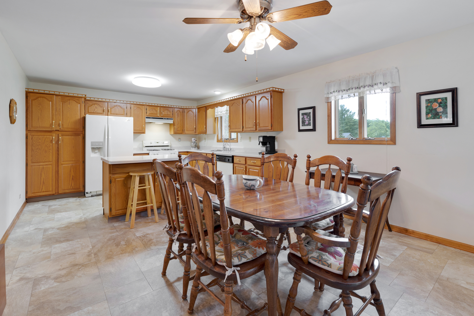 12402 Ridge Road Genoa, IL 60135 - Photo 9 of 31 a view of a dining room with furniture and window