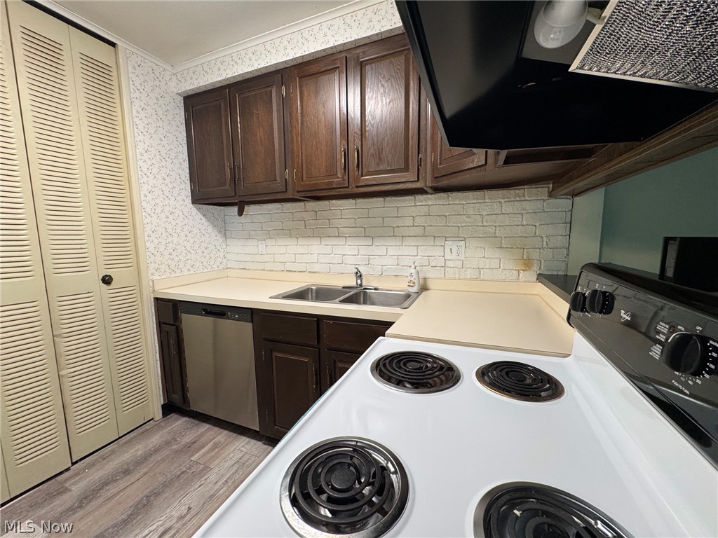 7294 Fox Mill Road, Unit 19D Mentor, OH 44060 - Photo 14 of 27 Kitchen view and utility closet for Furnace and HW tank