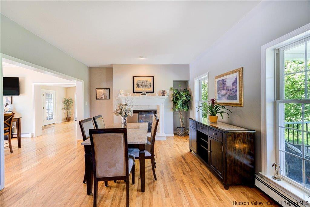 1237 Hoagerburgh Road Wallkill, NY 12589 - Photo 13 of 35 a view of a dining room with furniture window and wooden floor
