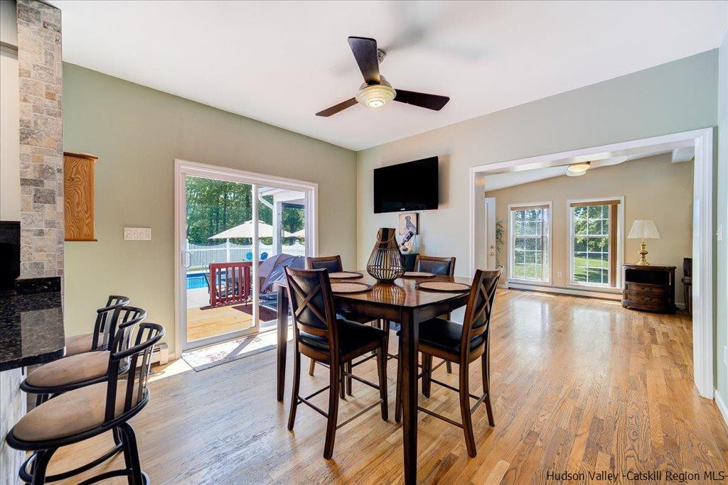 1237 Hoagerburgh Road Wallkill, NY 12589 - Photo 14 of 35 a view of a dining room with furniture window and wooden floor