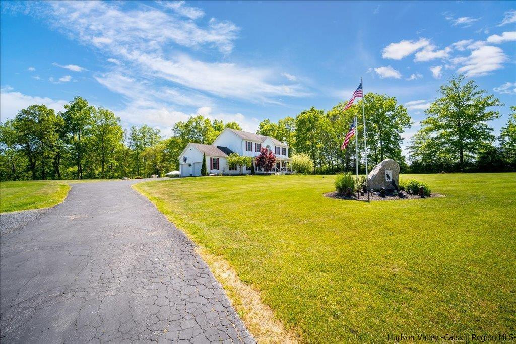 1237 Hoagerburgh Road Wallkill, NY 12589 - Photo 2 of 35 a view of a swimming pool and an outdoor seating