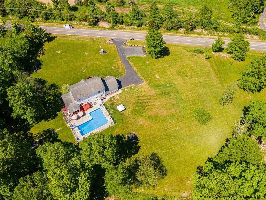 1237 Hoagerburgh Road Wallkill, NY 12589 - Photo 34 of 35 an aerial view of a swimming pool with outdoor seating