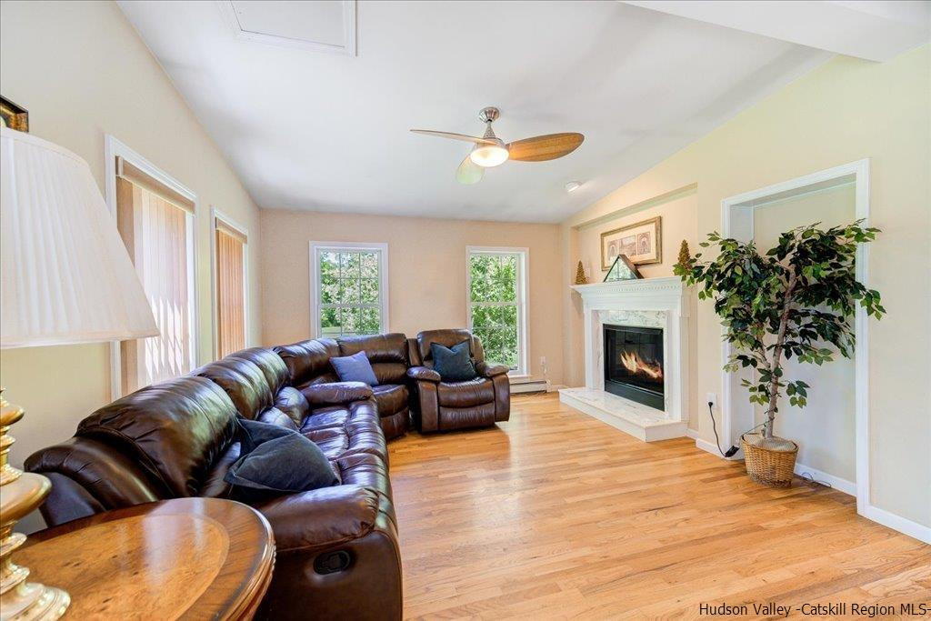 1237 Hoagerburgh Road Wallkill, NY 12589 - Photo 5 of 35 a living room with furniture a window and a fireplace