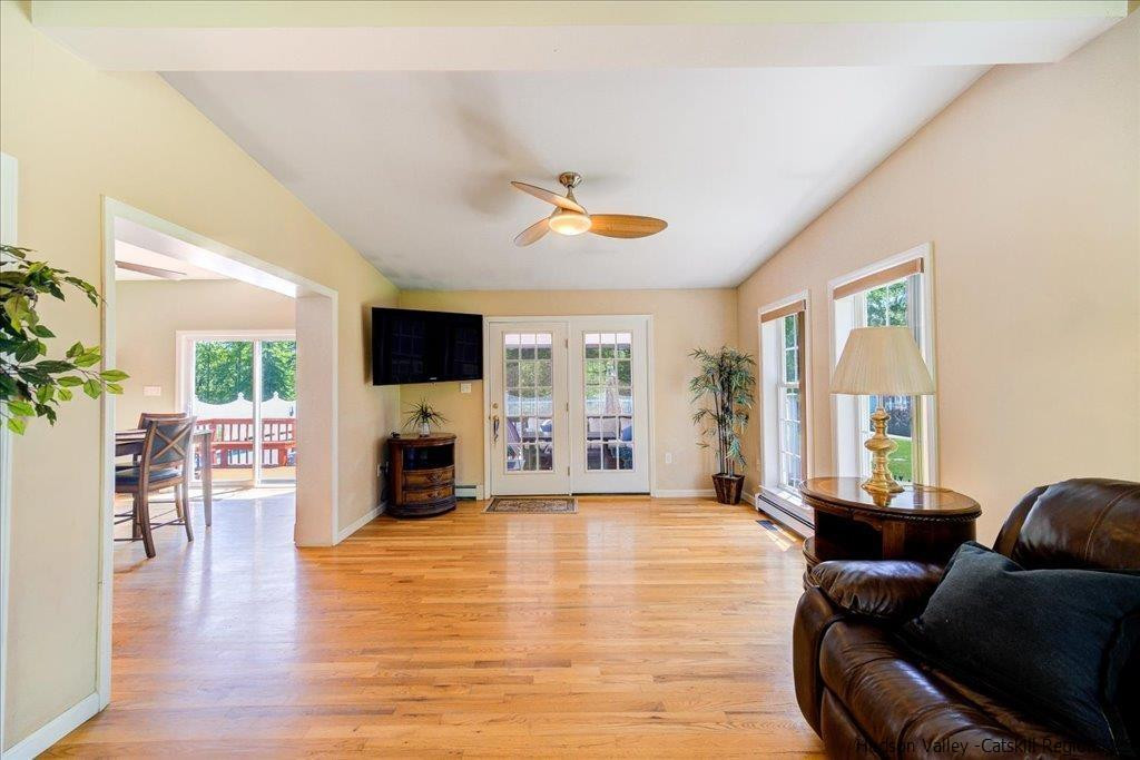 1237 Hoagerburgh Road Wallkill, NY 12589 - Photo 6 of 35 a living room with furniture fireplace and flat screen tv