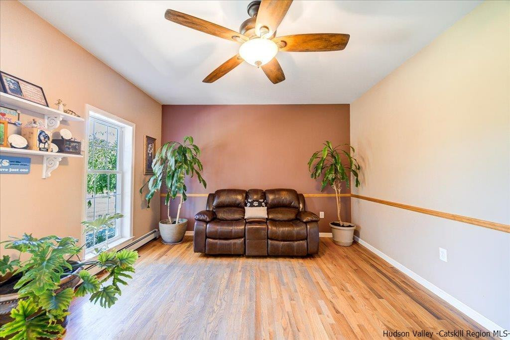 1237 Hoagerburgh Road Wallkill, NY 12589 - Photo 10 of 35 a living room with furniture and a potted plant