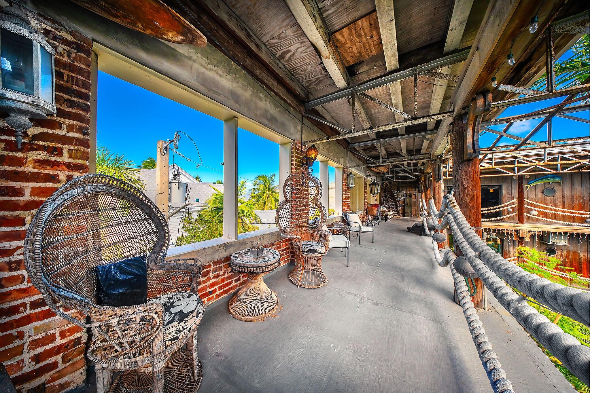 314 Simonton Street Key West, FL 33040 - Photo 20 of 32 a view of entryway with wooden floor
