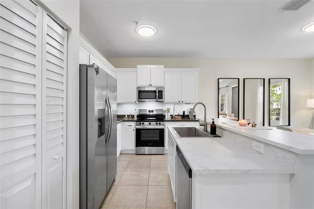a view of a livingroom with furniture and window