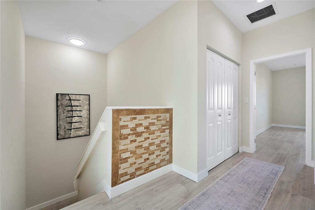 163 Southwest 7th Street Pompano Beach, FL 33060 - Photo 20 of 54 an empty room with windows and closet