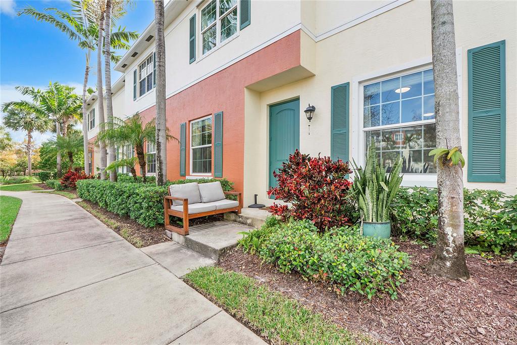 163 Southwest 7th Street Pompano Beach, FL 33060 - Photo 2 of 54 a front view of a house with garden