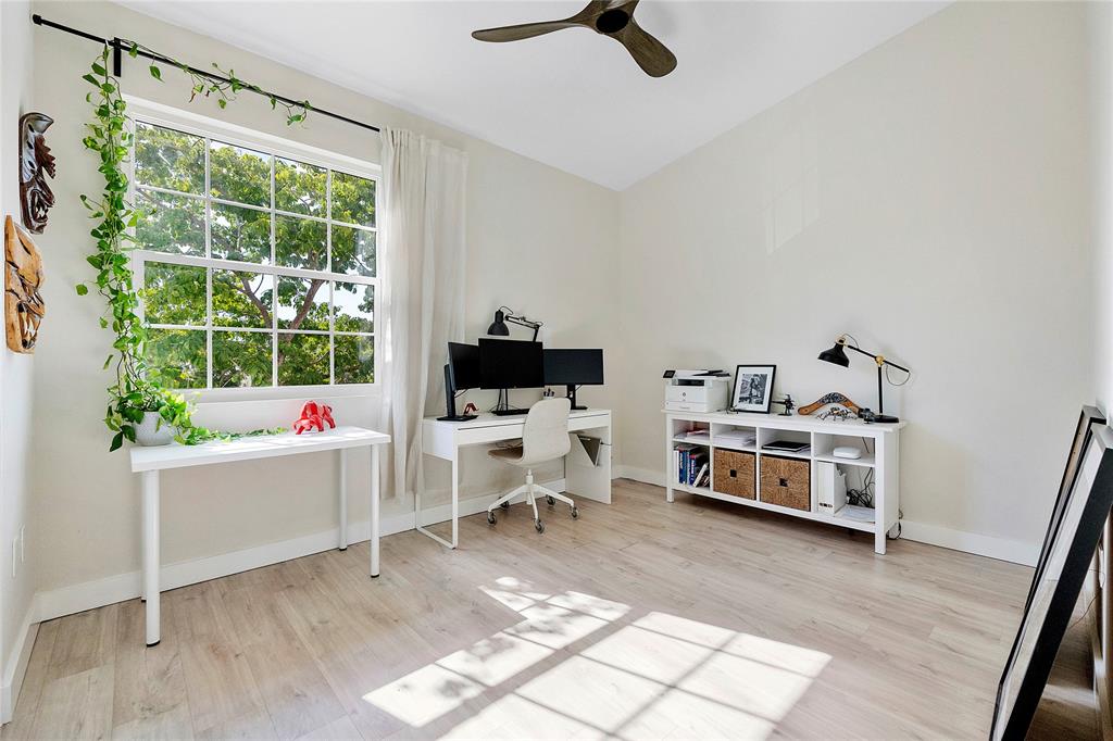 163 Southwest 7th Street Pompano Beach, FL 33060 - Photo 21 of 54 a view of a living room and a wooden floor