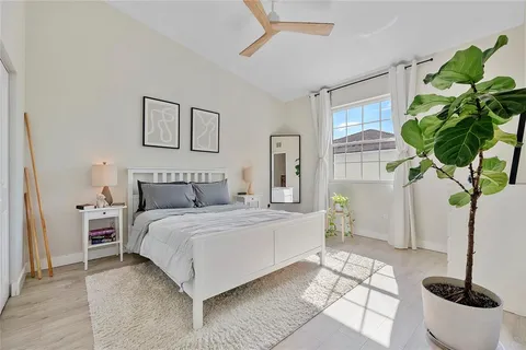 a view of a hallway with wooden shelves