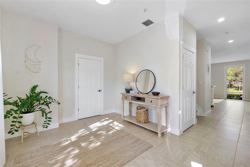 163 Southwest 7th Street Pompano Beach, FL 33060 - Photo 3 of 54 a view of a kitchen with a sink and a stove