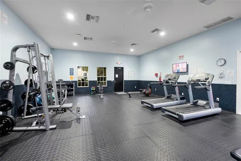 an aerial view of a house with a big yard