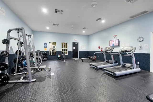 an aerial view of a house with a big yard