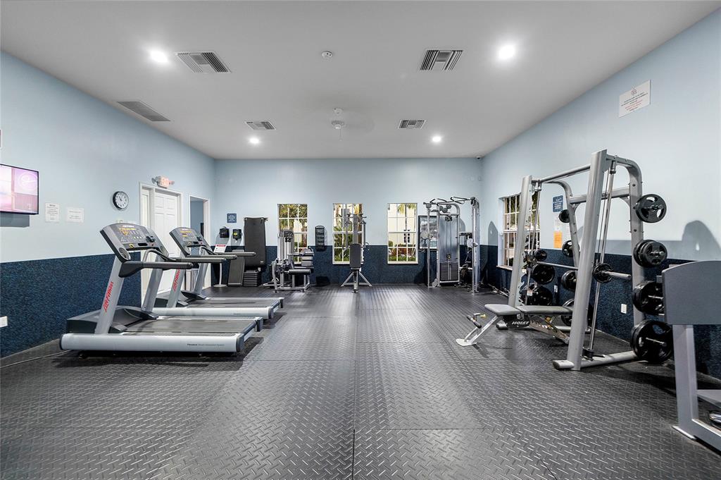 163 Southwest 7th Street Pompano Beach, FL 33060 - Photo 37 of 54 a view of a room with gym equipment