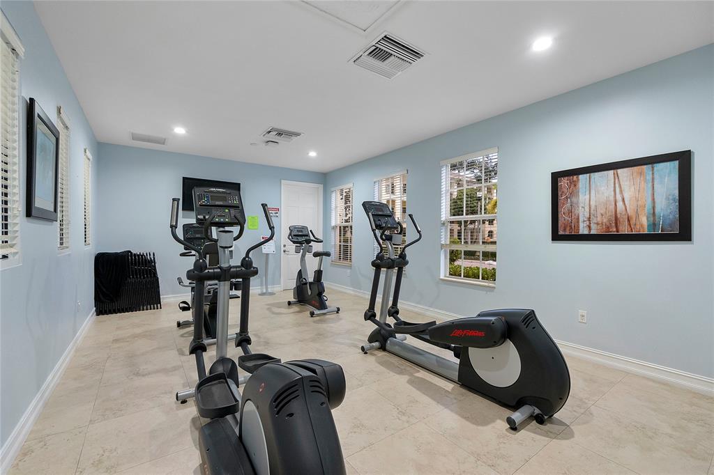 163 Southwest 7th Street Pompano Beach, FL 33060 - Photo 38 of 54 a view of a room with gym equipment