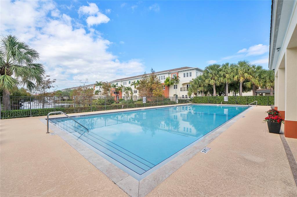 163 Southwest 7th Street Pompano Beach, FL 33060 - Photo 41 of 54 a view of swimming pool with a yard