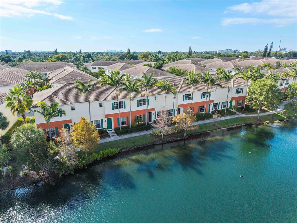 163 Southwest 7th Street Pompano Beach, FL 33060 - Photo 46 of 54 an aerial view of residential houses with outdoor space and lake view